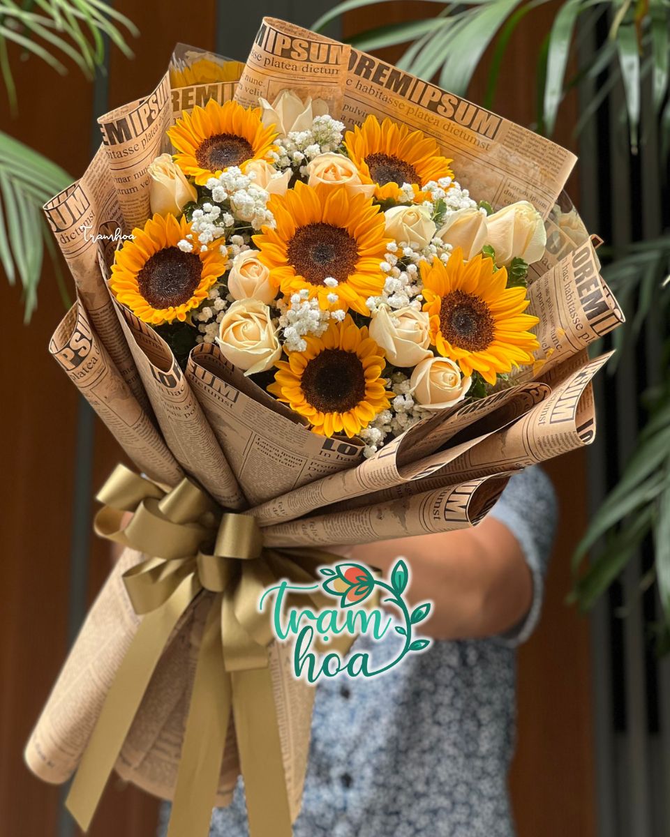Bó hướng dương kết hợp hoa hồng cam – Truyền cảm hứng và sức sống