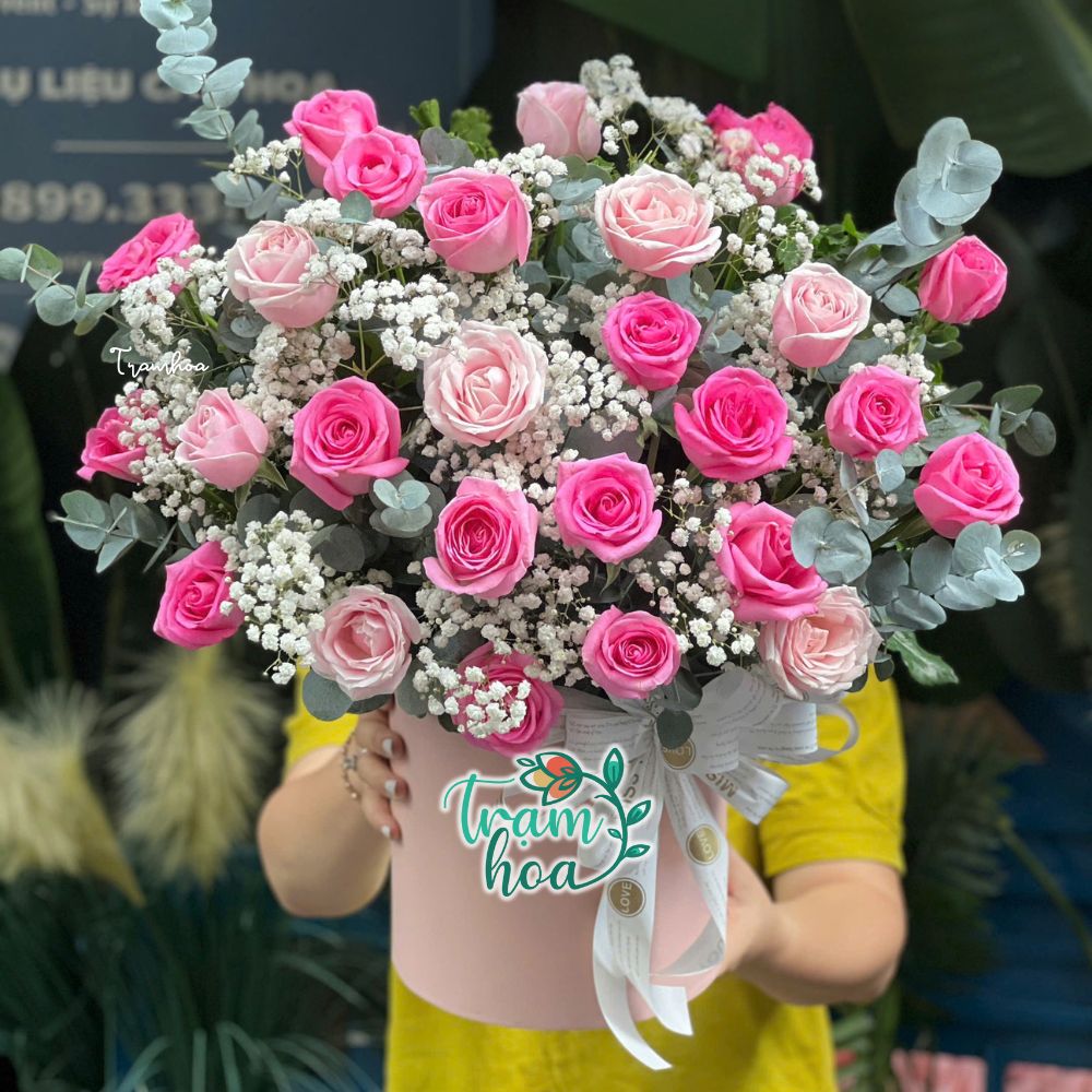 Giỏ hoa tone hồng pastel chúc mừng khai trương pet shop