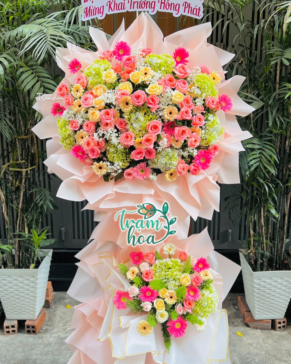 Ke hoa khai truong tham my vien tone hong kem vang Kệ hoa khai trương thẩm mỹ viện tone hồng kem vàng